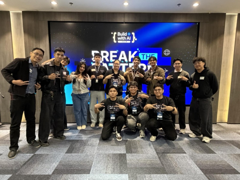 Group photo at Build with AI — Break the Pattern event